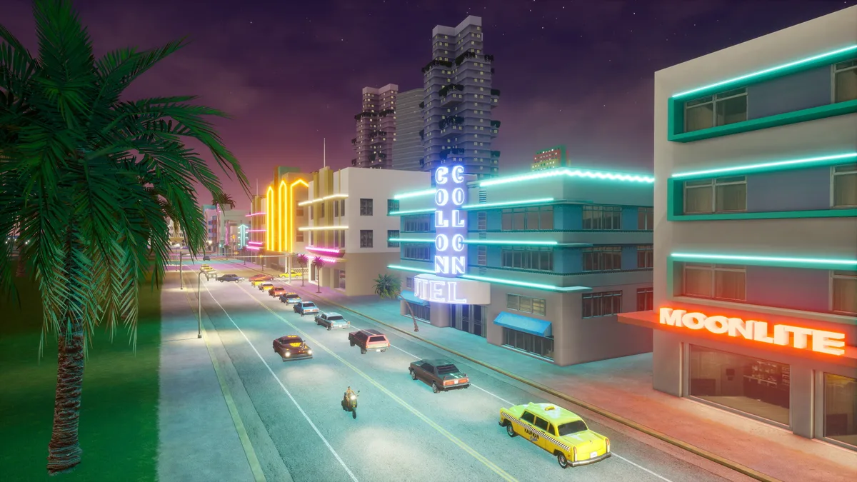 GTA Vice City Definitive Edition: gece neon ışıklar altında Ocean Drive ve trafik